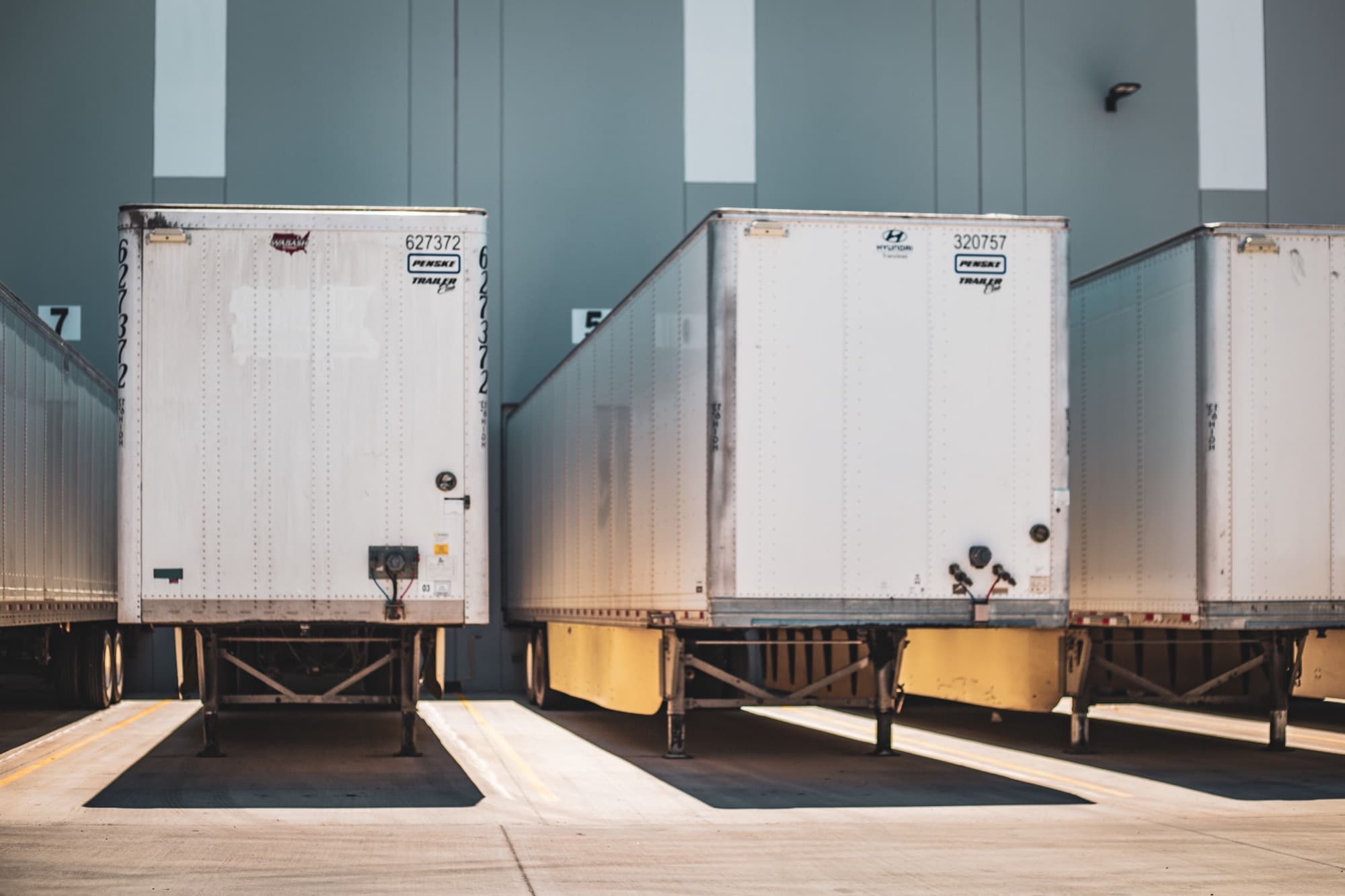 Freight trailers docked at a distribution warehouse